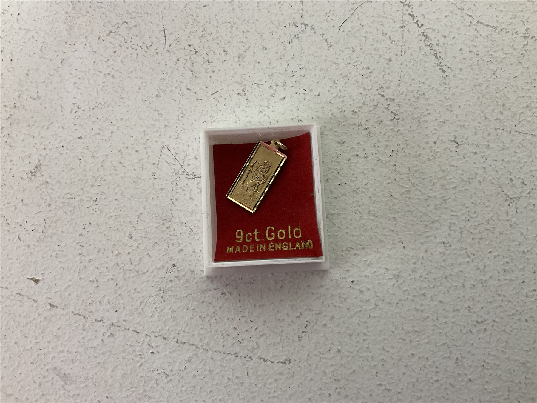 9ct gold St Christopher charm, together with a collection of costume jewellery including beaded necklaces, gold plated flat link bracelet and two wristwatches