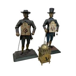Two 29th century reproduction German traveling clockmaker figures and a small battery operated miniature lantern clock