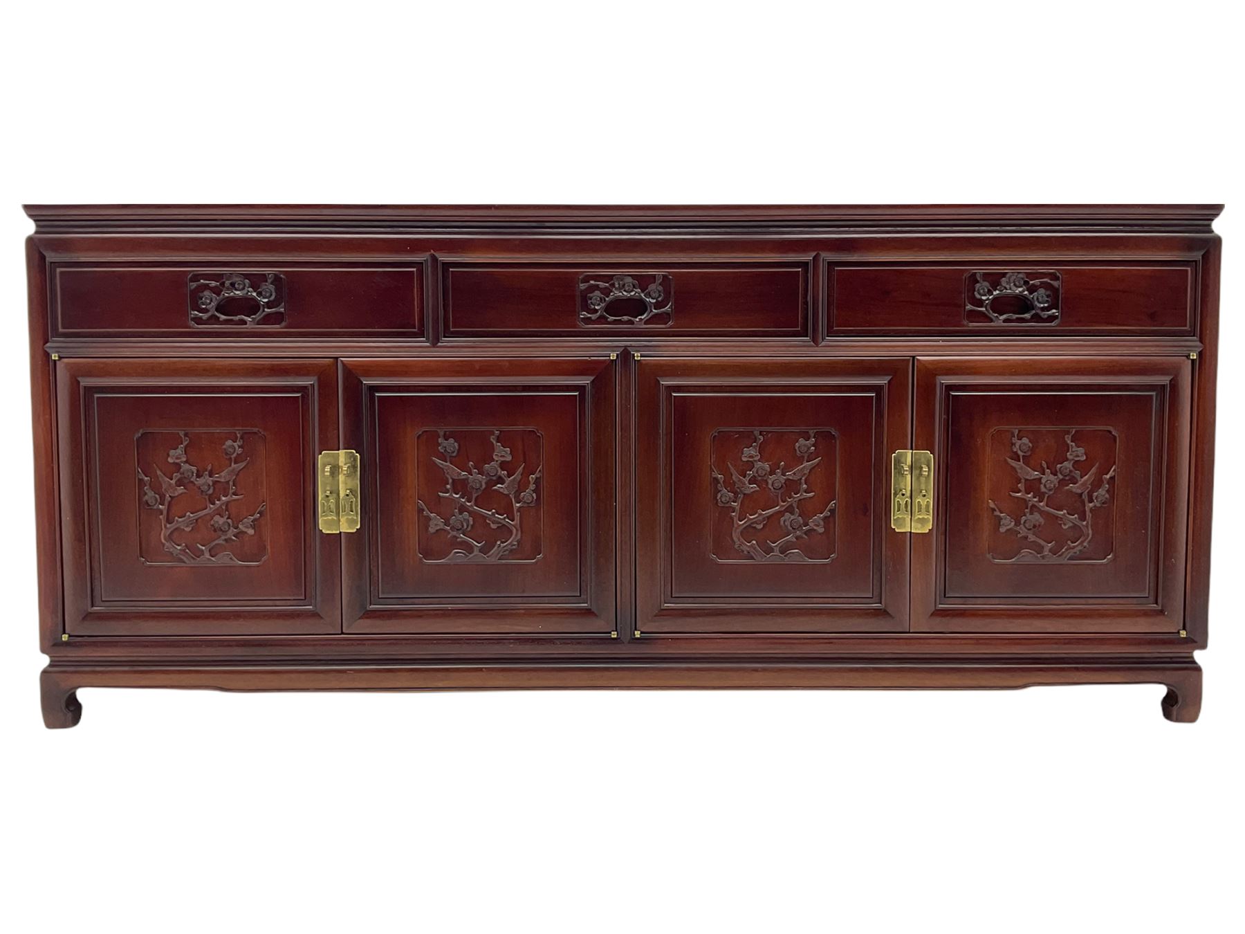 Chinese hardwood sideboard, three drawers above four cupboards, the doors relief carved with flowers and birds 