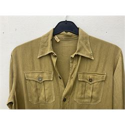 1930s Hitler Youth brown shirt, long length with two pockets, bears triangular badge 'Nord Nordsee'