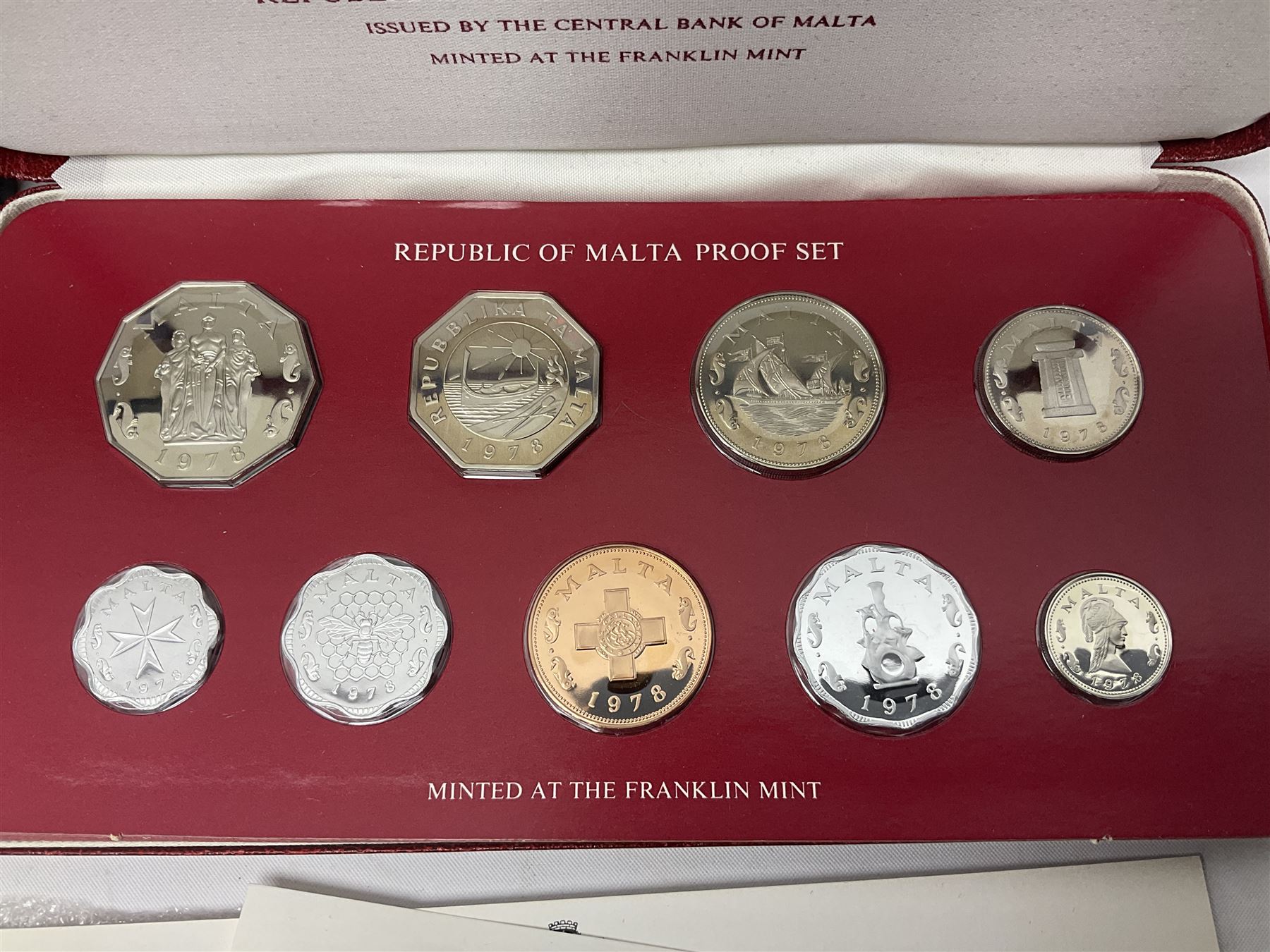 First National Coinage of Barbados 1973 proof eight coin set, from ten dollars to one cent, the ten dollar coin minted in sterling silver, the five dollar coin minted in 800 silver, and a Barbados 1974 proof eight coin set, both minted at The Franklin Mint, cased with certificates; two Republic of Malta decimal proof coin sets, dated 1978 and 1979, the 1979 one pound coin minted in sterling silver, both minted at The Franklin Mint, cased with certificates; Cayman Islands 1973 proof eight coin set, minted at the Royal Canadian Mint, cased; and a Cayman Islands 1979 proof eight coin set, the five dollar to fifty cents coins each minted in sterling silver, minted at the Franklin Mint, cased with certificate (6)
