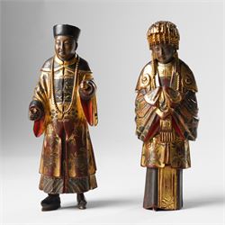 Pair of Chinese carved wooden lacquered figures, in ceremonial dress, possibly wedding att...