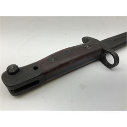 Australian Owen sub-machine gun bayonet, the 25.5cm fullered steel blade marked '53'; in metal bound wooden scabbard marled MA53 L41cm overall