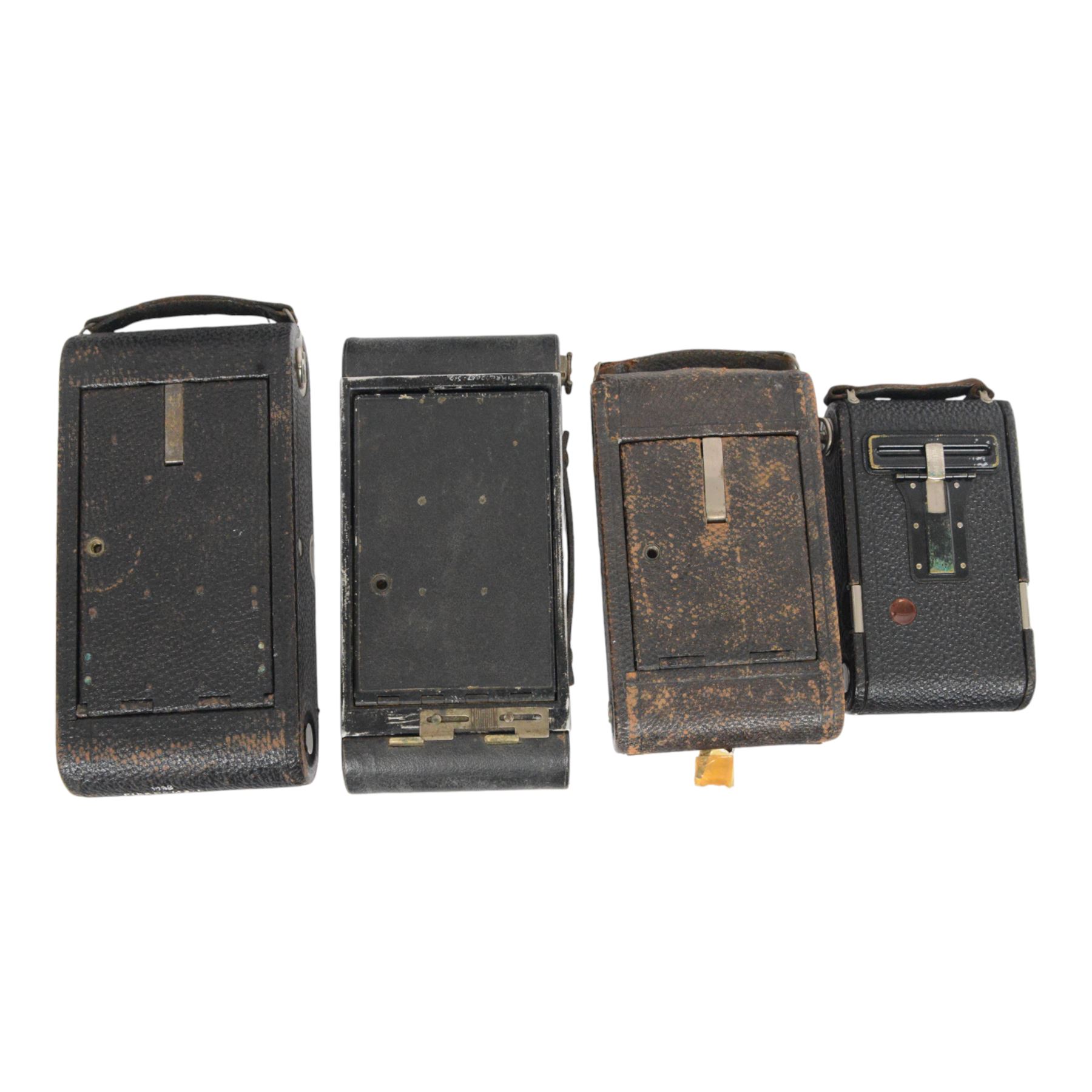 Four Eastman Kodak Co. folding cameras, comprising No. 3-A Folding Autographic Brownie, No. 3-A Folding Pocket Kodak model B-4, No. 1 Kodak Junior and No. 3  Folding Pocket Kodak model C