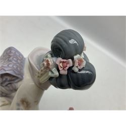 Two Lladro Japanese Ladies figures, comprising Kiyoko no 1450 and Yuki no 1448, both issued 1983, retired 1998, largest example H20cm