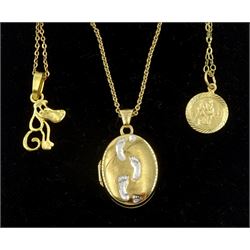 Three 9ct gold pendant necklaces to include dog, footstep and St Christopher, all hallmarked or tested