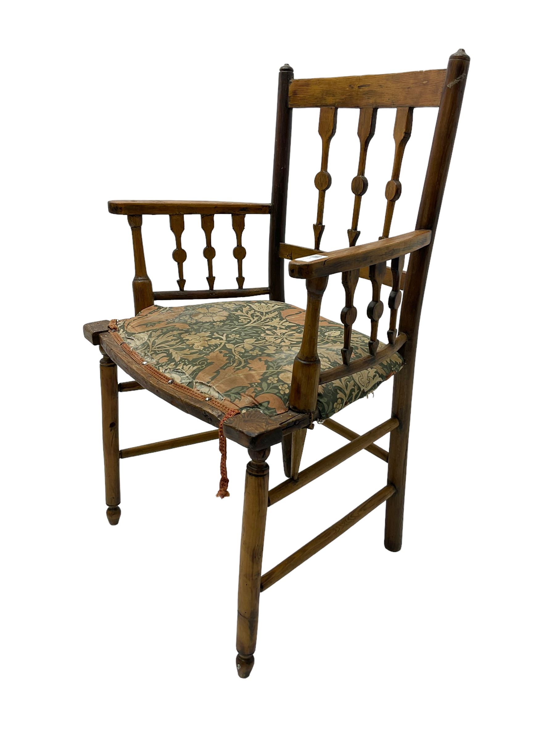 19th century ash and beech Sussex type elbow chair, the back and arms with arrow shaped vertical rails, upholstered seat, on turned supports