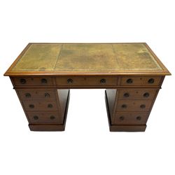 Howard & Sons. - 19th century walnut twin pedestal desk, moulded rectangular top with tooled leather inset, fitted with nine drawers with circular pressed brass handle plates decorated with urns, each drawer fitted with a 'Hobbs, London' lock, on plinth base, the upper right-hand drawer stamped 'Howard & Sons, Berners St.' and with paper label