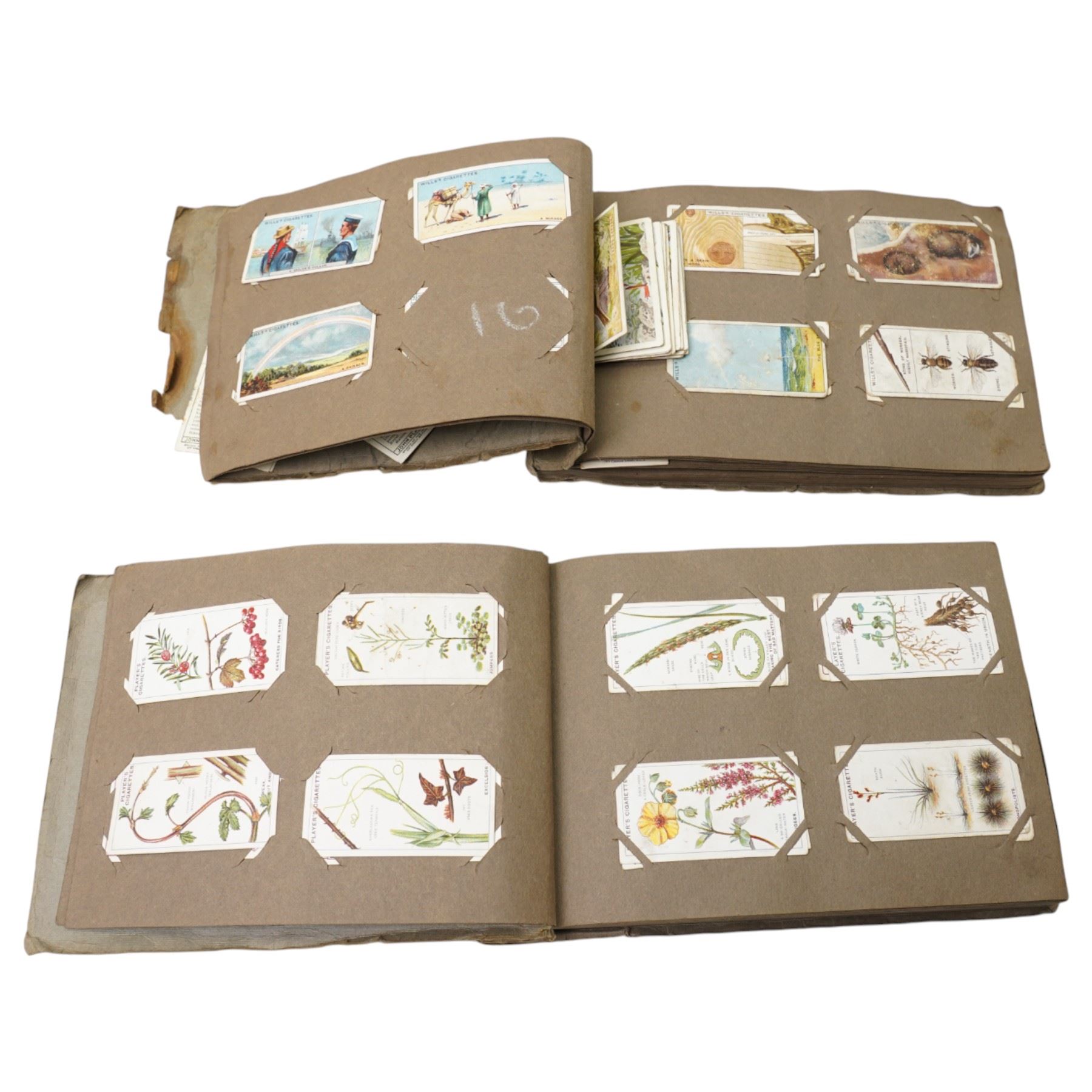 Two cigarette card albums and contents of various cards