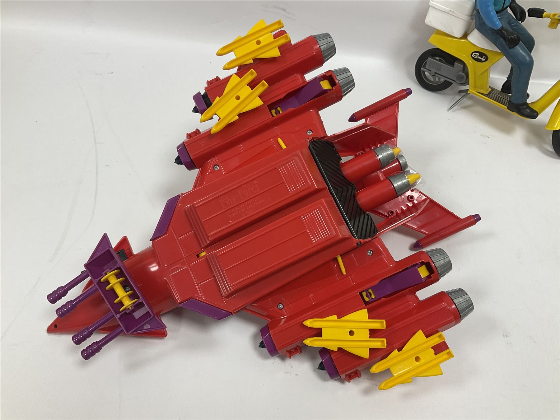 Manta Force Red Venom 1987 Bluebird Toys PLC toy plane with associated figures, with three more toy vehicles and figures comprising Lanard 1996 S.T.A.R Force Mobile Ground Support truck, Hasbro 2000 Action Man motorbike with side car, Sindy moped 