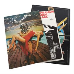 Music memorabilia, including cardboard globe, a free gift with the Wings Over America vinyl, music programmes, including Concert for George, Paul McCartney World Tour, Wings programmes, Glastonbury 1986, 10CC programmes, Knebworth Fair 1976 programme, etc