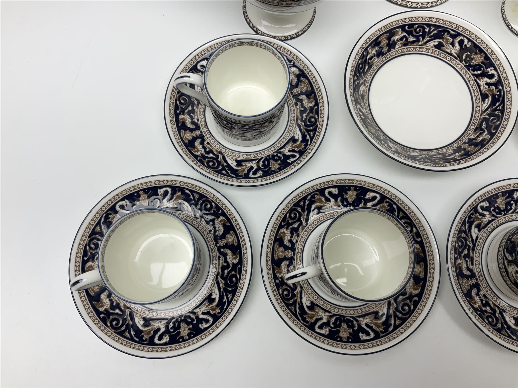 Wedgwood navy Florentine pattern coffee service for six, comprising coffeepot, coffee cans and saucers, milk jug, twin handled covered sucrier and small dish