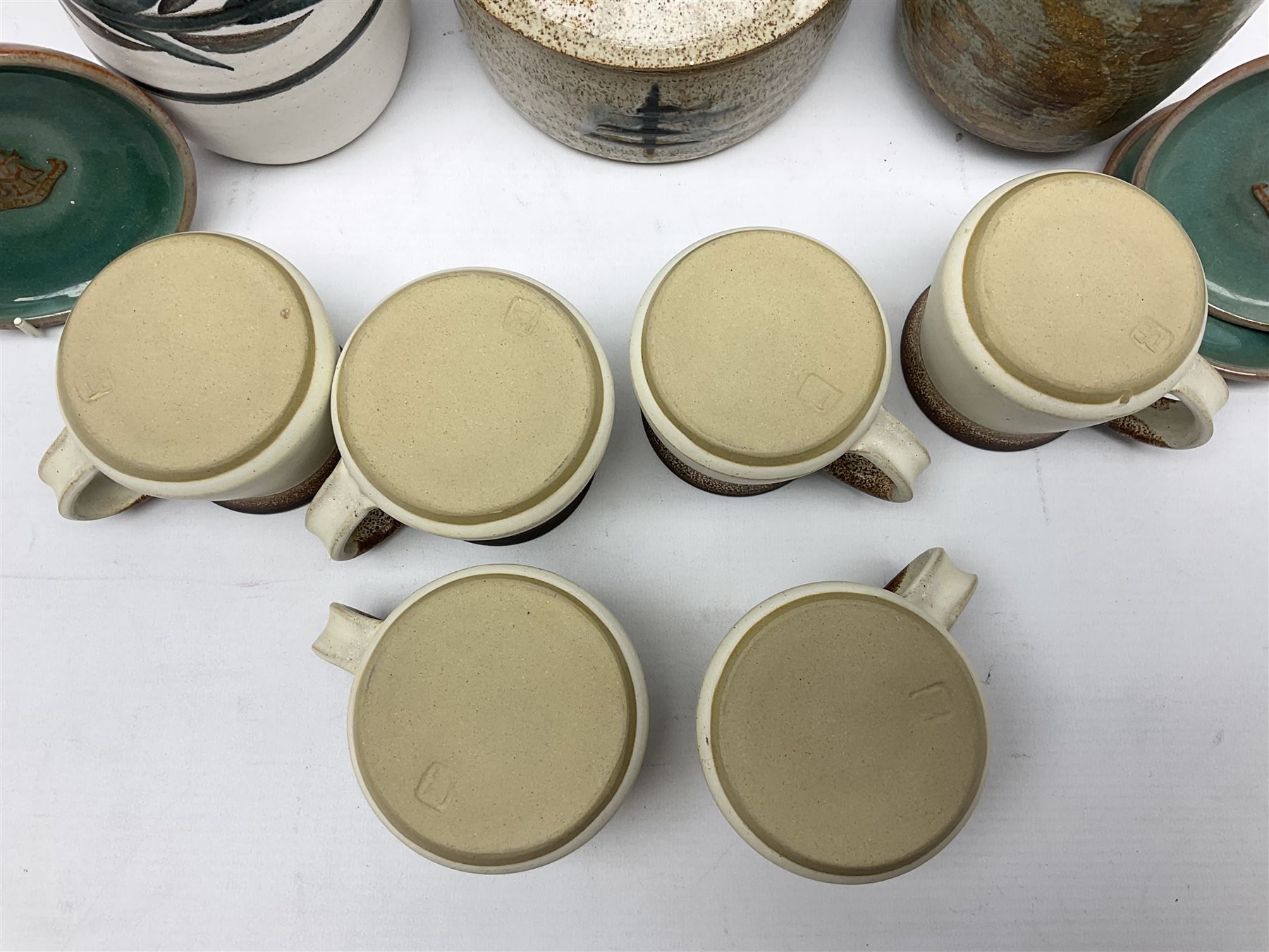 Collection of studio pottery, to include salt glaze vase with trailed decoration, impressed JH mark, possibly Joanna Still (nee Harrisson), set of six cups and vase by Diana Eden with impressed DE marks beneath, etc