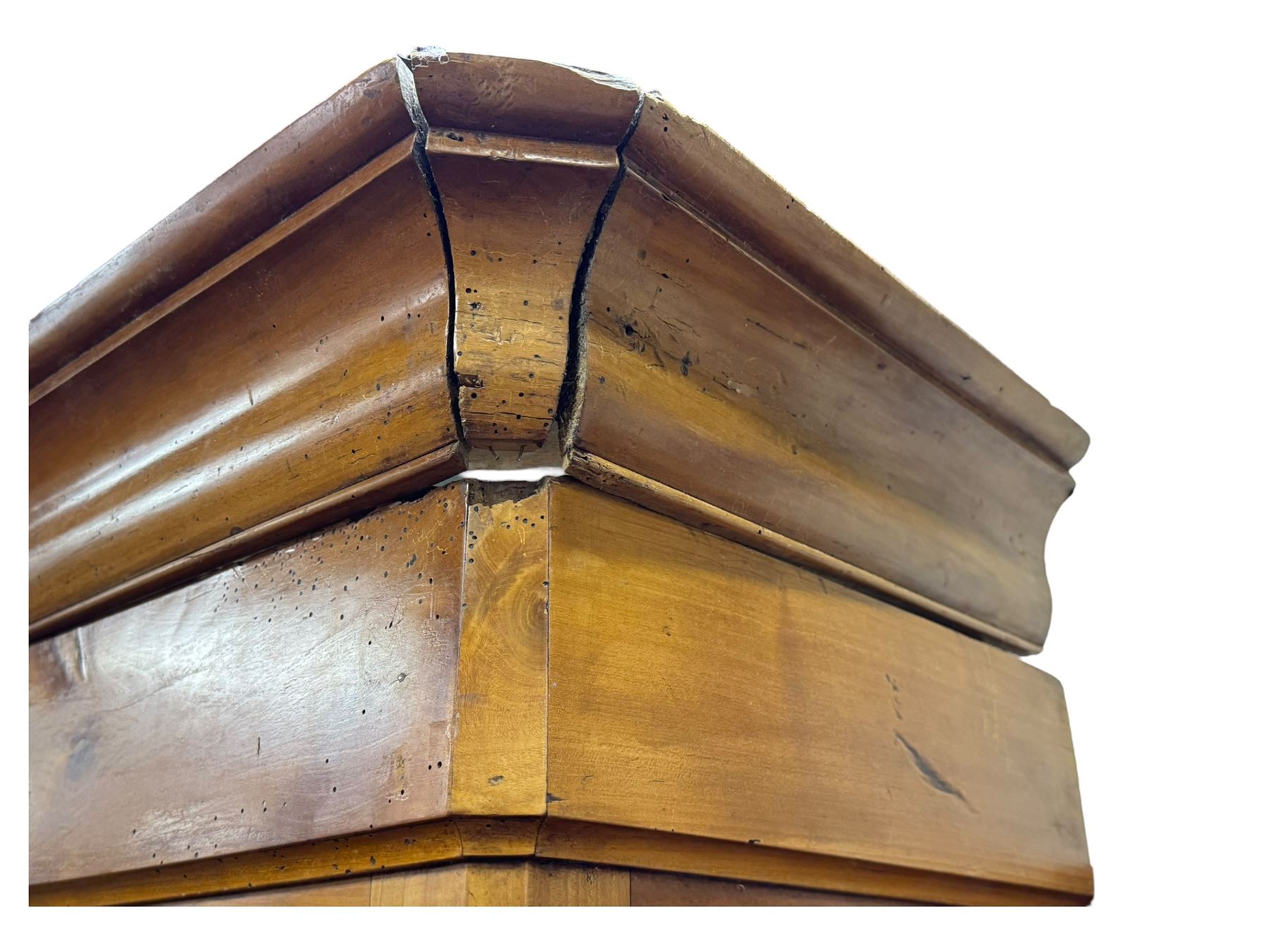 19th century French walnut dresser, the moulded cornice over two-panelled cupboard doors, enclosing two shelves and one small
drawer, on a base of two further cupboards
