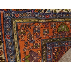  Iranian ivory ground wool rug, central hexagonal medallion, 175cm x 122cm  