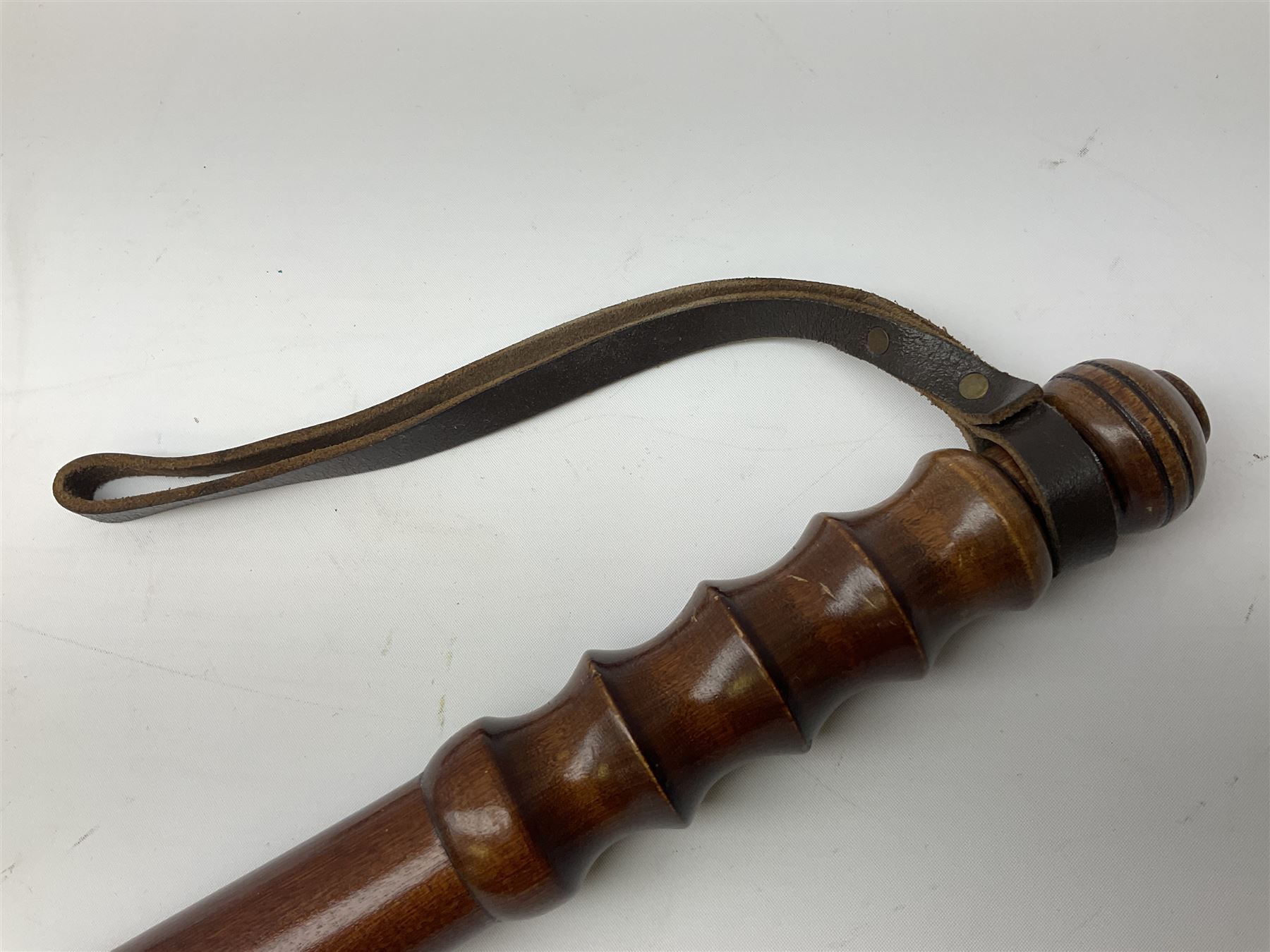 Three police turned hardwood truncheons comprising two patrol truncheons and WPC short truncheon (3)