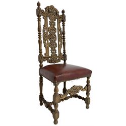 Carolean design oak high-back chair, the cresting rail carved with S-scrolls and foliage, the splat with a central flower head decorated with extending scrolls and acanthus leaves, upholstered seat, on turned and block supports united by S-scroll carved middle rail and turned stretchers