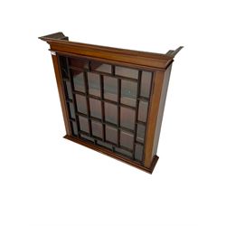 Early 20th century mahogany wall hanging cabinet, projecting cornice over single astragal glazed door