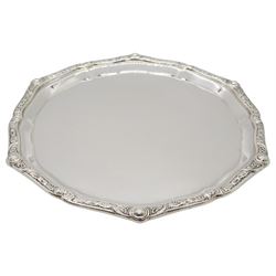Modern silver waiter, of circular form with petal type edge and Celtic design border, hallmarked Reid & Sons Ltd, Birmingham1963, D16cm, approximate weight 6 ozt (186.7 grams)