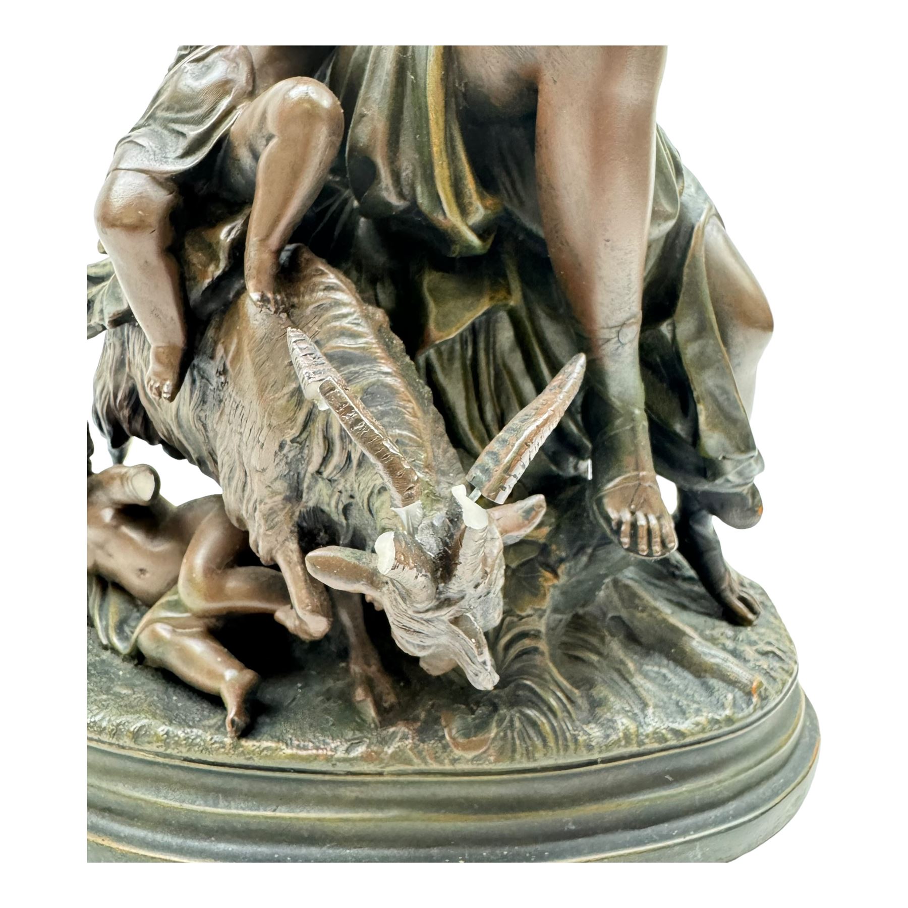 Large table lamp, the base modelled as a woman with putti and goat, with three glass shades, H90cm   