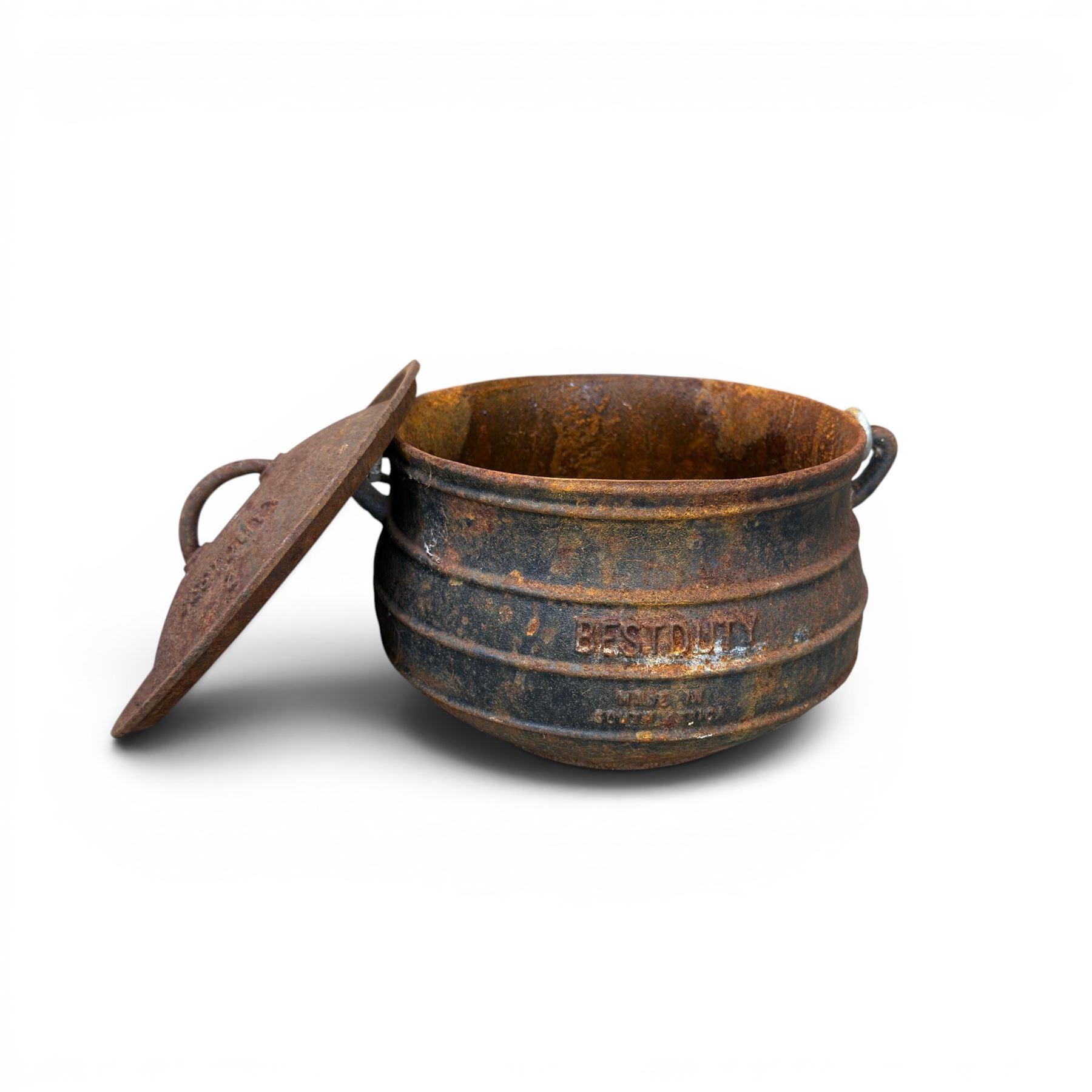 Three South African cast iron graduating cooking pots with lids and handles. Size shown for the largest