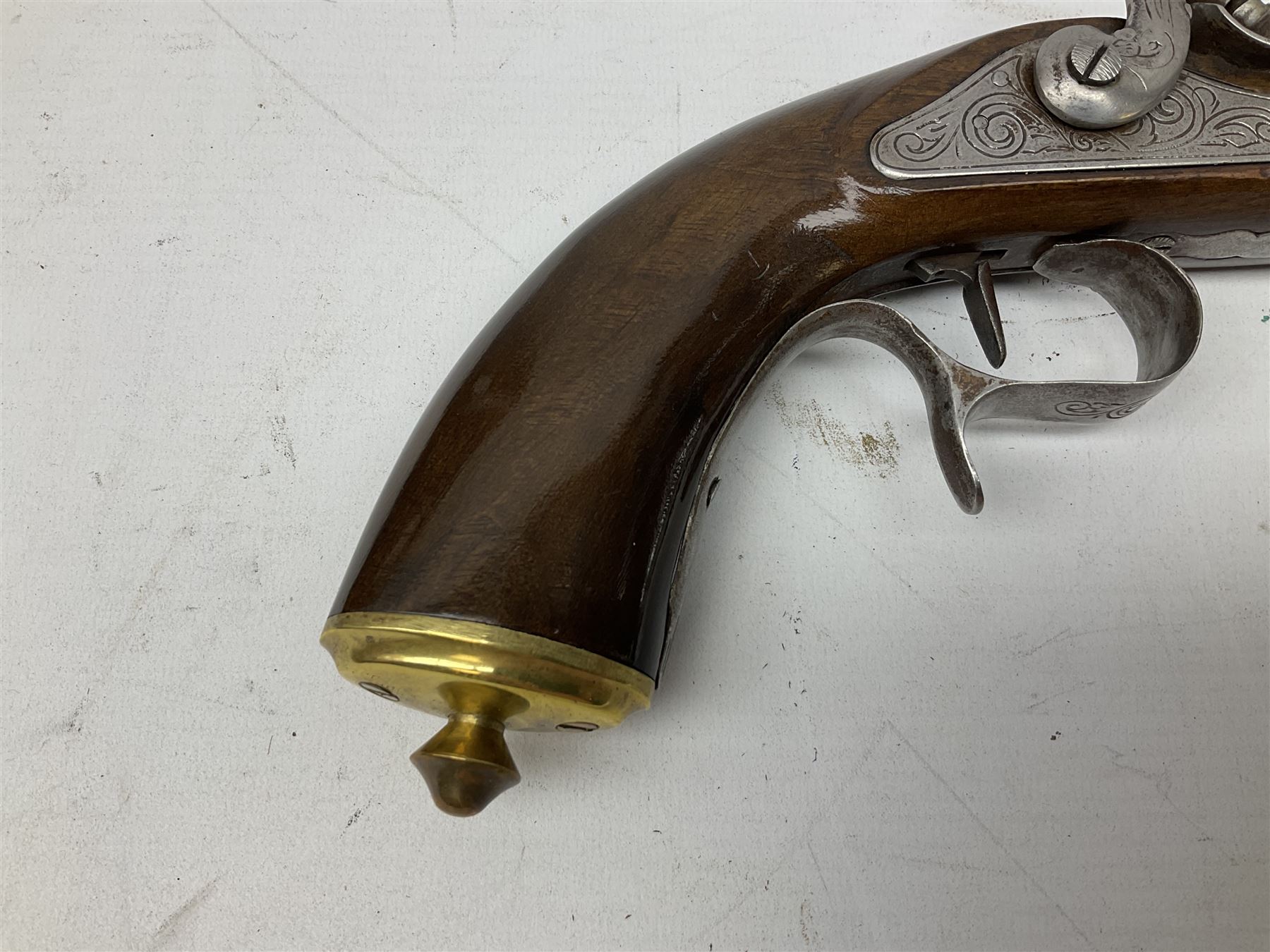 SECTION 1 FIREARMS CERTIFICATE REQUIRED OR REGISTERED FIREARMS DEALER - Pair of Reproduction Continental .44 calibre percussion target pistols, each with heavy 23.5cm octagonal to round barrel bearing various marks, crude scroll engraving to lock plate, hammer and octagonal section of barrel, unchequered walnut stock with brass butt plate and steel hooked trigger guard, numbered 8138 & 8164, L41.5cm overall; in maroon baize lined converted sapele mahogany fitted case bearing reproduction trade label for Trulock & Son Dublin containing small copper powder flask, steel scissor action bullet mould, nipple key, turned wooden mallet and lidded box, steel rammer and wooden cleaning rod, case L48cm