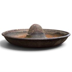 Two early 20th century cast iron ‘Mexican hat’ pig trough planters, each of circular dished form with central domed boss, one fitted with fixing studs for radial feeding divisions