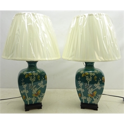  Pair Oriental style table lamps decorated with butterflies amongst foliage on turquoise ground on brushed brass base with shades, as new, H33cm  