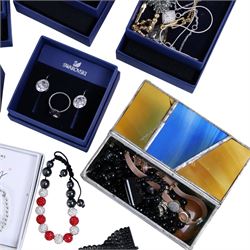 Collection of boxed Swarovski crystal jewellery, including statement necklaces, rings, bracelets and earrings, and a collection of costume jewellery including beaded necklaces