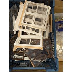 Dolls House building accessories, including three stair cases, a quantity of doors and windows, skirting board, coving, kitchen and fireplaces scenes and a collection of wired and non wired light fittings