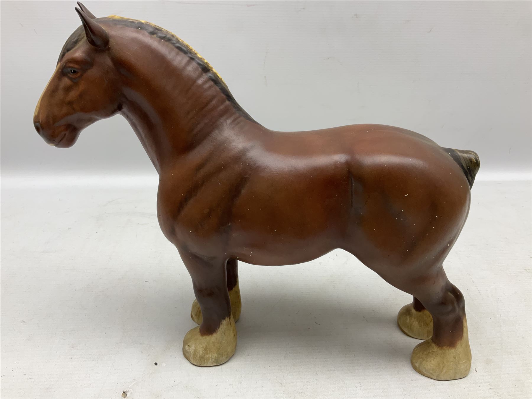 Group of three Beswick Shire horses, comprising CH. Burnham Beauty mare in matte finish, dapple grey horse and bay horse, all with stamped marks beneath