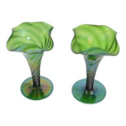 Near pair of art nouveau green iridescent glass vases with twisted stem and fluted rim, H15cm