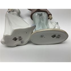 Eleven Nao figures to include Cowboy, Girl with Puppy, Clown, Girl in hat etc 