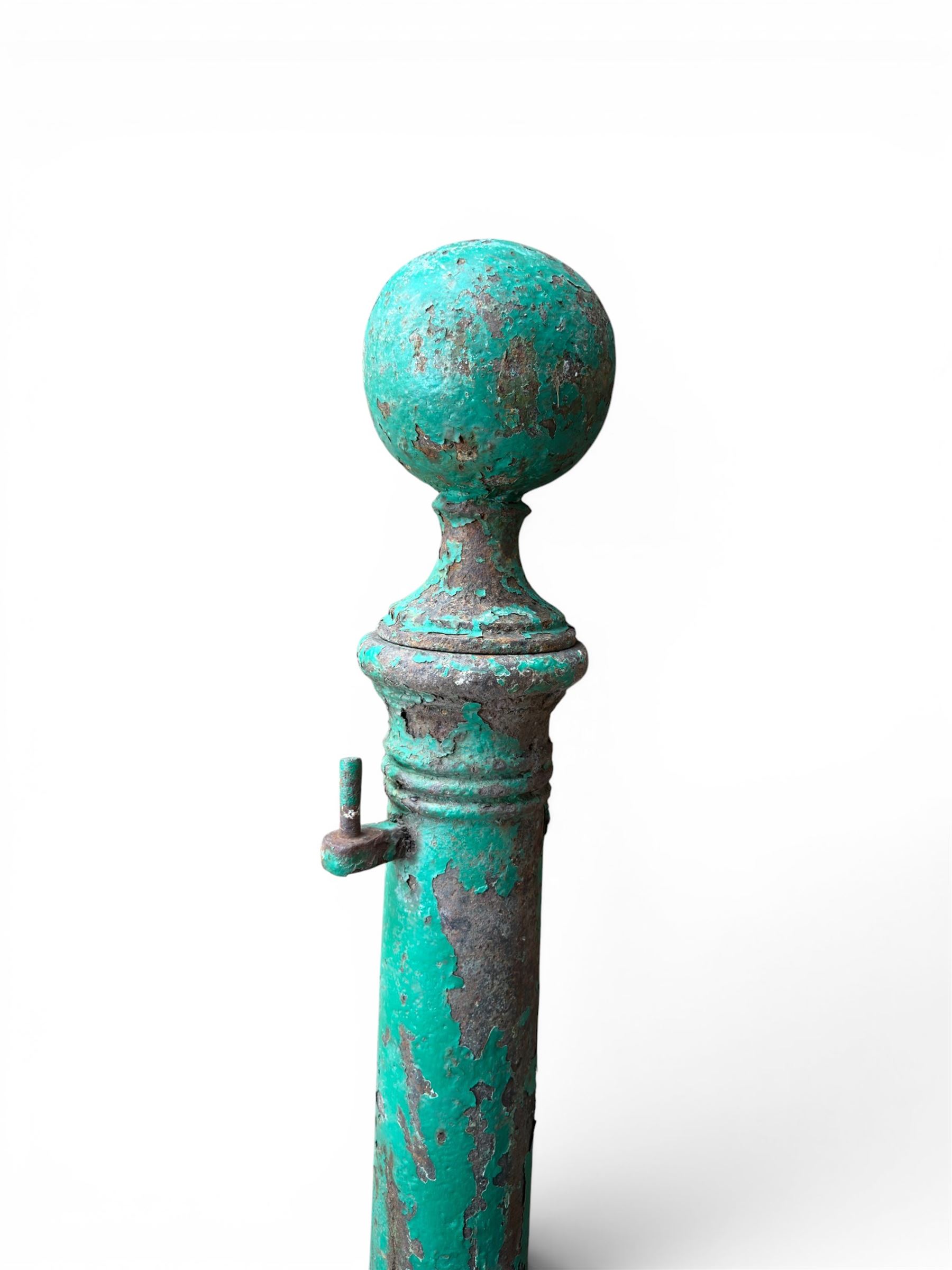 19th century circular cast iron gate post with finial, painted in distressed green finish