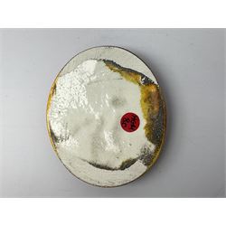 Henry George Murphy (1884-1939), collection of seven Arts & Crafts glazed ceramic roundels, of circular and oval form, five in tones of red and brown and two in tones of blue, turquoise and green in soufflé and high fired finishes, largest example D6.5cm
