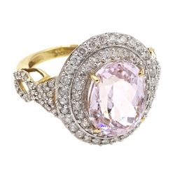  18ct gold oval kunzite and two row diamond cluster ring, with diamond set shoulders by  Lorique, hallmarked  
[image code: 4mc]