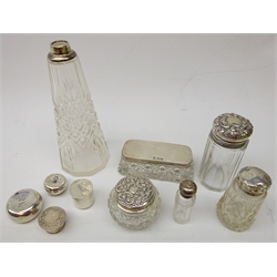  Collection of Edwardian silver topped dressing table jars, silver pill box, silver lids etc   