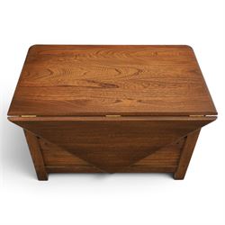 Ercol -  dark elm corner TV stand and coffee table, TV stand with drop triangular leaf, over open recess above a single drawer (H 47cm, D 44cm with leaf 79cm, W 73cm,  the coffee table with chamfered rectangular top with full length undertier, raised on turned supports (H 43cm, D 54cm, W 115cm) 