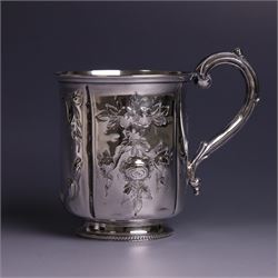 Victorian silver christerning mug, of cylindrical form with four panels of embossed floral...