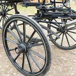 Victorian Glass Hearse

A black painted four wheeled horse drawn glass hearse with extensively glazed coffin compartment, etched glass side and end panels, decorative gilt cresting, gilt column capitals, white painted interior bier deck, metal coffin rails with cross finials, rear glazed access doors, external coachman's box seat for two, wooden spoked wheels the wheel hubs stamped 'The Economic Funeral Co', leaf spring suspension, underbody turntable steering and pole for driving with a pair of horses. The hearse has decorative painted lining throughout and an ornate black and gilt body with curved glass panels to the sides and rear.

Features

• Extensively glazed coffin compartment
• Etched glass side and end panels
• Decorative gilt cresting
• Gilt column capitals
• White painted interior bier deck
• Metal coffin rails with cross finials
• Rear glazed access doors
• External coachman's box seat
• Wooden spoked wheels
• Leaf spring suspension
• Underbody turntable steering
• Pole for driving with a pair of horses
• Decorative painted lining

Dimensions:
Overall length: 406 cm
Body length: 250 cm
Overall width: 190 cm
Body width: 115 cm
Height: 228 cm

Wheel Diameters:
Front wheels: 102 cm
Rear wheels: 133 cm

Seating

Coachman's box seat: 2