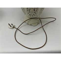 Modern pierced oriental white ceramic vase shaped table lamp, together with a blue and white baluster shaped example decorated with figures upon elephants, both with shades, tallest H83cm incl shade