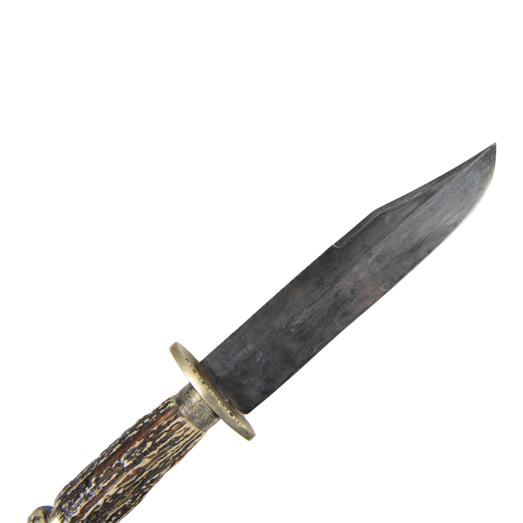 Fred W James Sheffield bowie knife, the 24cm blade engraved 'The United States the Land of the Free and the Home of the Brave..', stag handle, pommel in the form of a horse's head, with leather sheath, L42cm
The pommel motif is a classic bowie fitting, the book Tweedale, G: The Sheffield Knife book has an illustrated example on p87