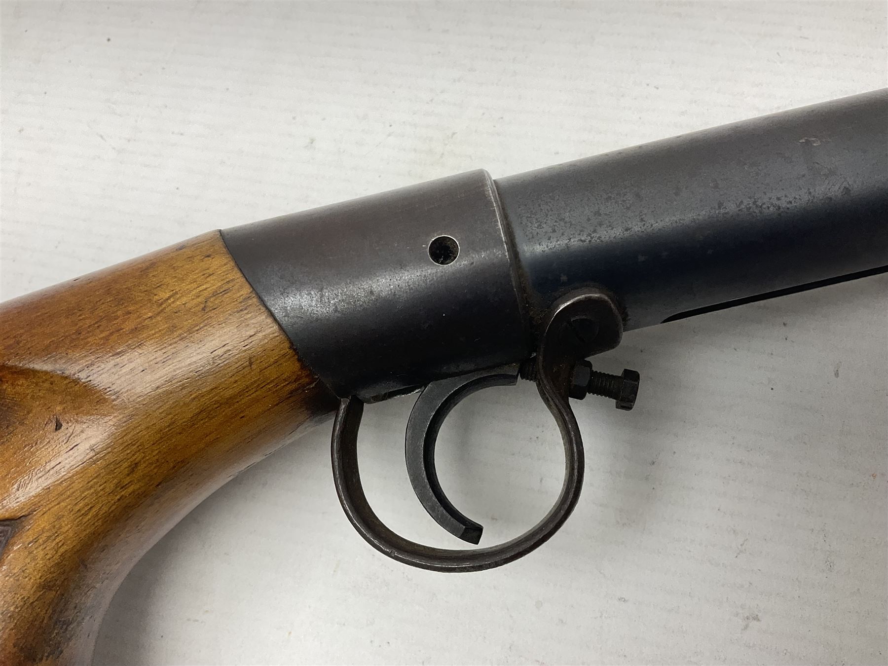Early 20th century BSA Standard .177 Cal. Air Rifle (No.1), early A prefix number A67, with blued finish, top-loading, push-button underlever action, walnut semi-pistol grip stock with chequered BSA logo L101cm overall; with contemporary canvas case; NB: AGE RESTRICTIONS APPLY TO THE PURCHASE OF AIR WEAPONS.