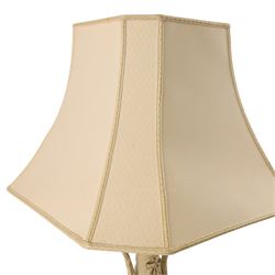 Table lamp modelled as a twin handled urn, decorated in relief with floral sprigs, upon a stepped rectangular base, with a cram lampshade, H53cm, without lampshade 
