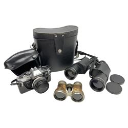 Olympus OM10 35mm camera, cased; pair of USSR 7 x 50 binoculars; cased; and pair of Le Jockey Club Paris binoculars