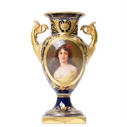 19th century Berlin porcelain urn, with twin gilt volute handles, painted with a portrait ...