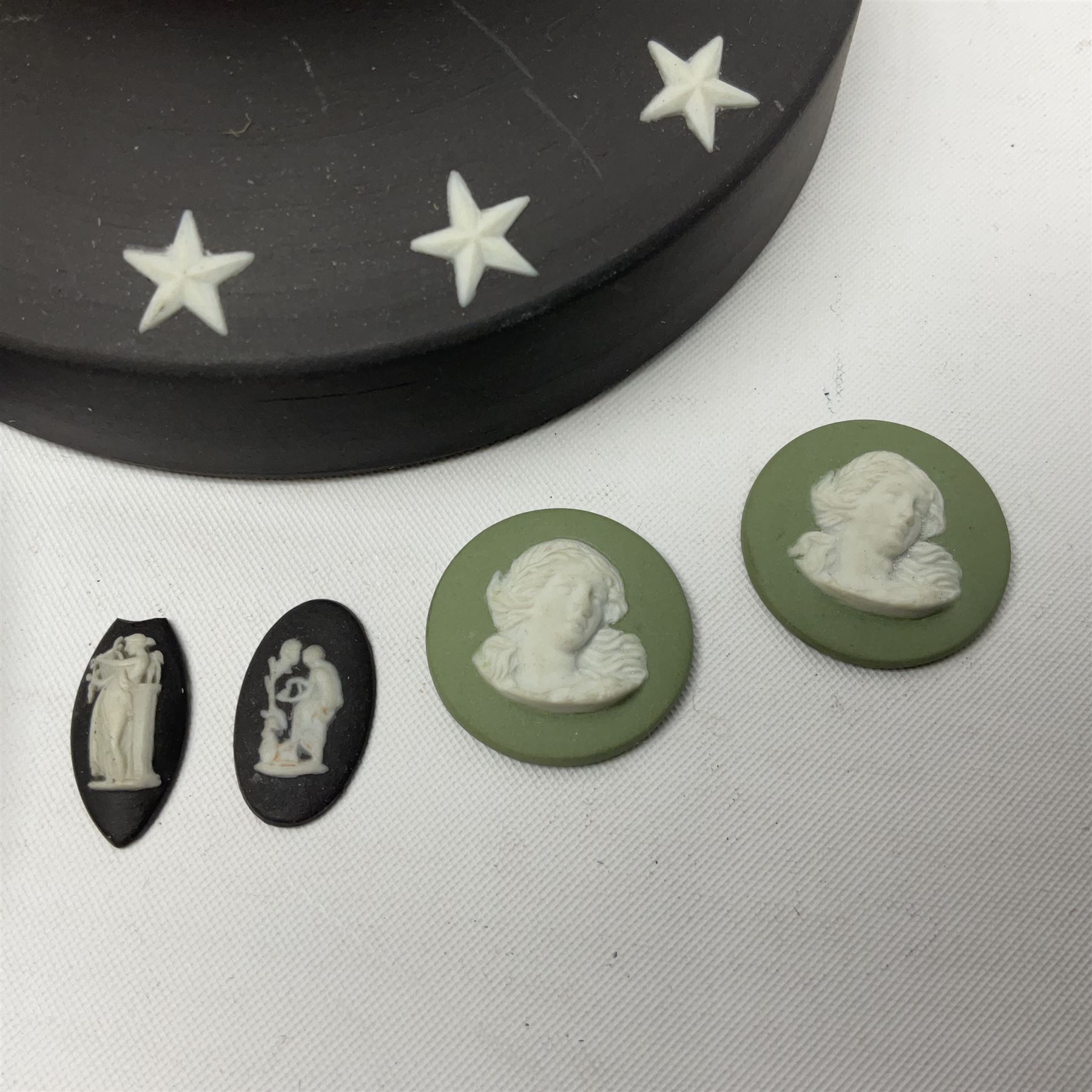Collection of Wedgwood Jasperware, to include black Eisenhower Bust, two black basalt paperweights, one depicting an eagle and one depicting Julius Caesar, a blue Zodiac plate, Man on the Moon commemorative plate, American Independence Bicentennial plate and Royal commemorative ware, etc, all with impressed marks beneath, some with boxes