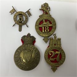 Fifteen cap badges of Irish interest including 4th Royal Irish Dragoon Guards, Connaught Rangers, Royal Irish, Munster and Dublin Fusiliers, 5th Lancers, Inniskilling Regt.,Leinster Regt., Irish Guards etc (15)