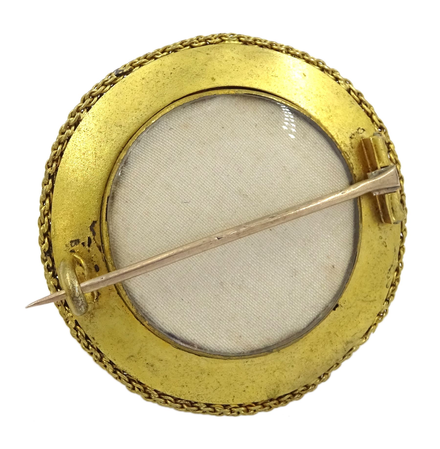 Victorian 18ct gold enamel and seed pearl hinged bangle and matching brooch, each star set with a seed pearl and blue enamel dome within a circular cannetille frame, each with a glazed panel verso, the hinged bangle with foliate engraved decoration, in fitted case