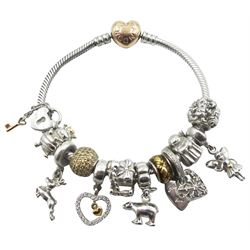 Silver Pandora bracelet with 14ct gold p